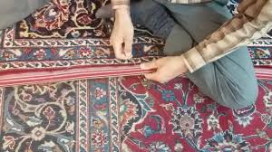 لفافه دوزی ریشه های فرش دستباف